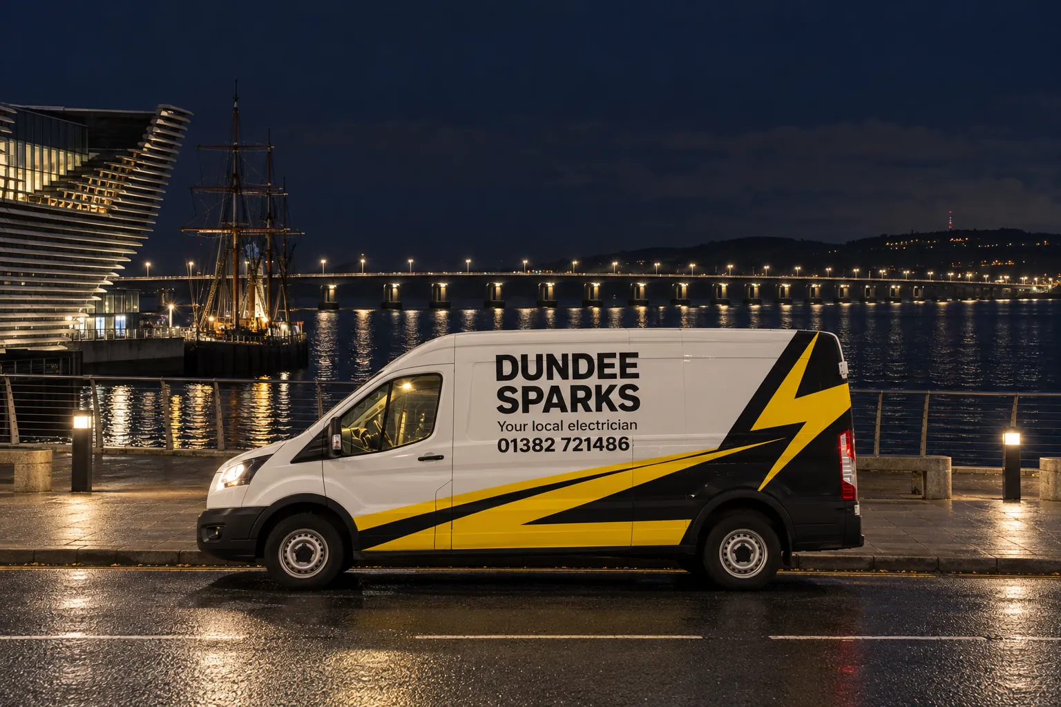 Dundee Sparks van on the Dundee waterfront at night with the Tay Road Bridge behind